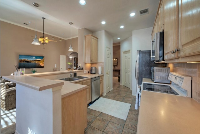 kitchen featuring kitchen peninsula, stove, light brown cabinetry, sink, and dishwasher