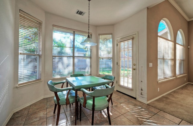 view of carpeted dining area