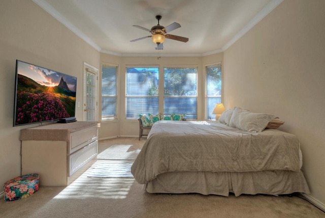 bedroom featuring light colored carpet, ceiling fan, and ornamental molding