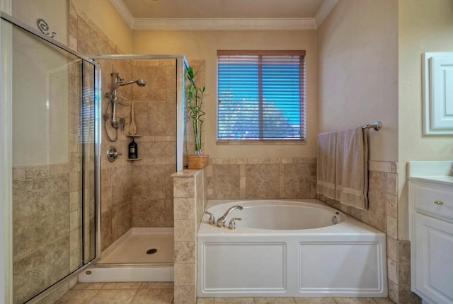 bathroom featuring tile patterned floors, crown molding, vanity, and independent shower and bath