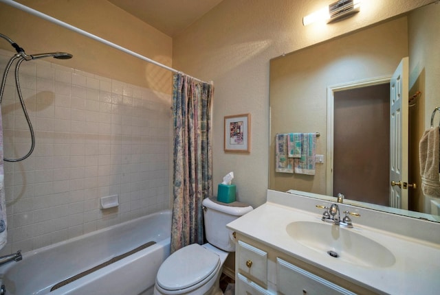 full bathroom featuring vanity, toilet, and shower / bathtub combination with curtain