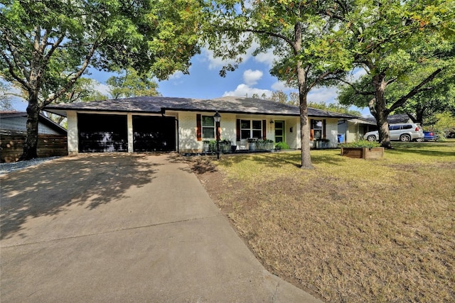 ranch-style home with a front yard and a carport