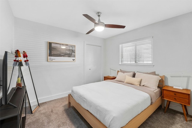 bedroom featuring carpet, a closet, and ceiling fan