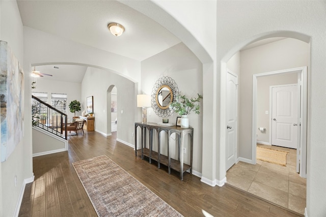 corridor with dark hardwood / wood-style floors