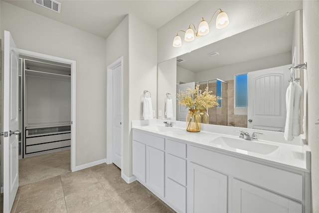 bathroom featuring vanity and walk in shower