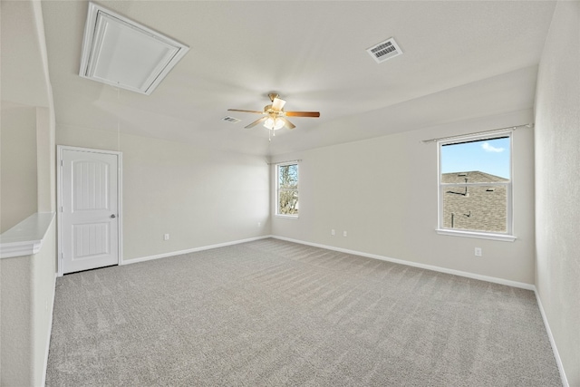 empty room featuring light carpet and ceiling fan