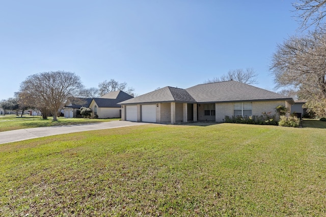 ranch-style home with a garage and a front lawn