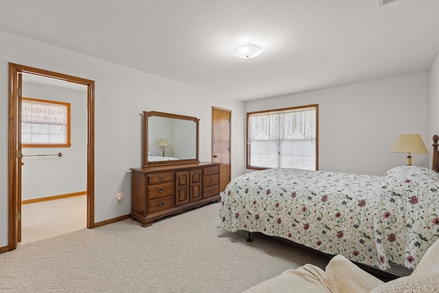 bedroom with light carpet