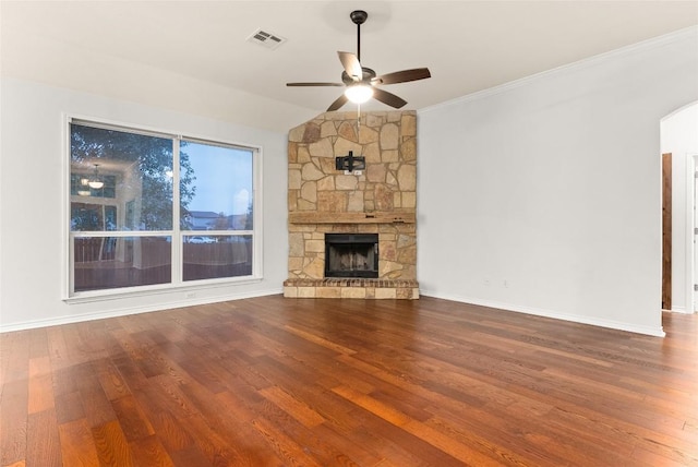 unfurnished living room with a fireplace, hardwood / wood-style flooring, ceiling fan, and lofted ceiling