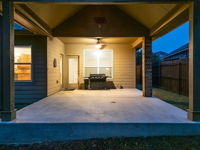 view of patio featuring ceiling fan