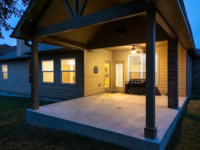 exterior space featuring ceiling fan