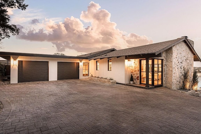 view of front of home with a garage