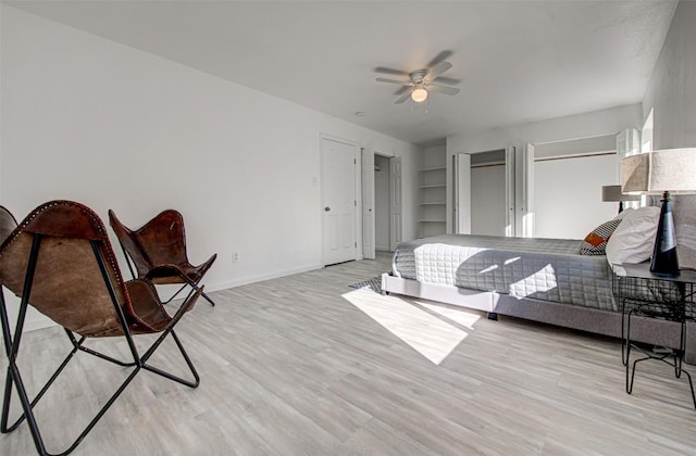 bedroom featuring ceiling fan and light wood-type flooring