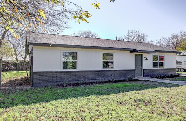 ranch-style house with a front yard