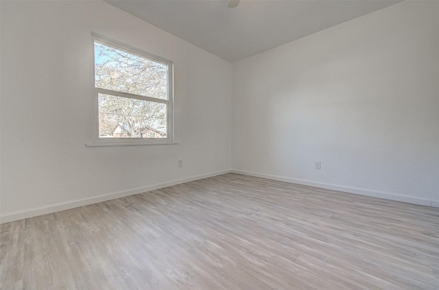 unfurnished room featuring light hardwood / wood-style flooring