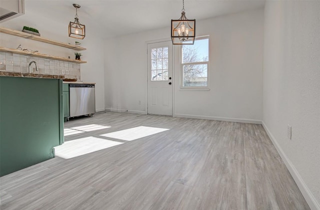 interior space with light hardwood / wood-style flooring and a chandelier