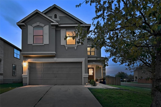 view of front of property with a garage