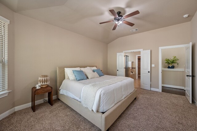 carpeted bedroom featuring ceiling fan and lofted ceiling