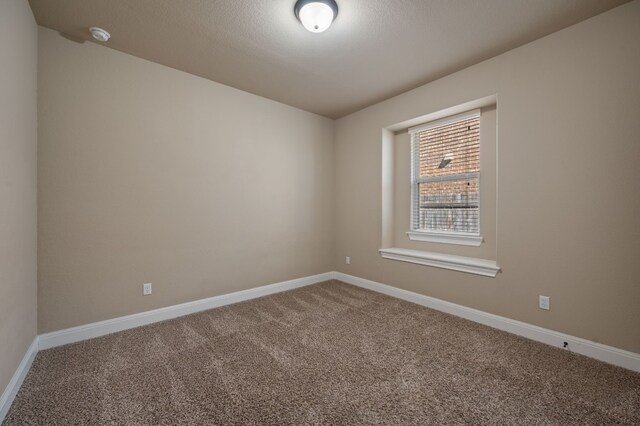 spare room with carpet flooring