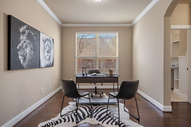 office area with dark hardwood / wood-style flooring and ornamental molding