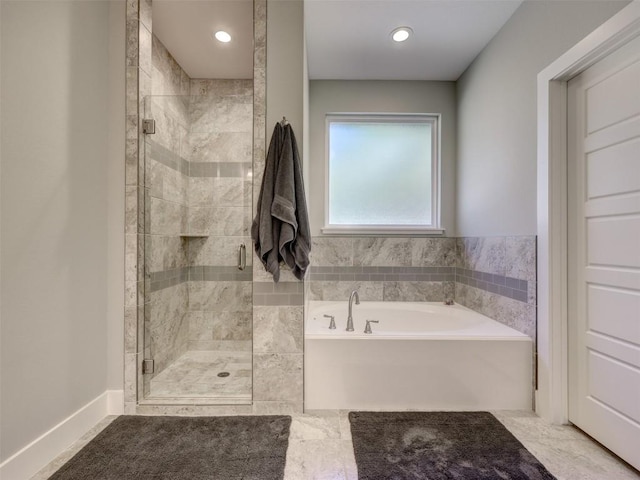 bathroom with independent shower and bath