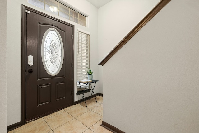 foyer with light tile patterned flooring