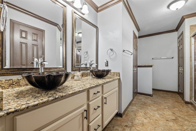 bathroom with vanity and crown molding