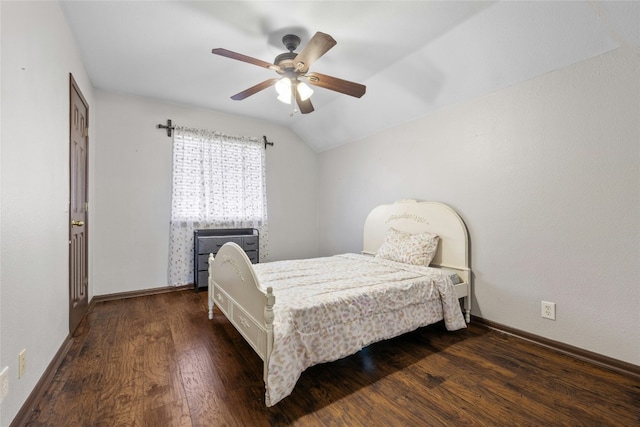 bedroom with dark hardwood / wood-style floors, ceiling fan, and lofted ceiling