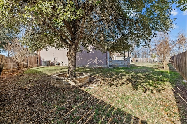 view of yard with central AC unit