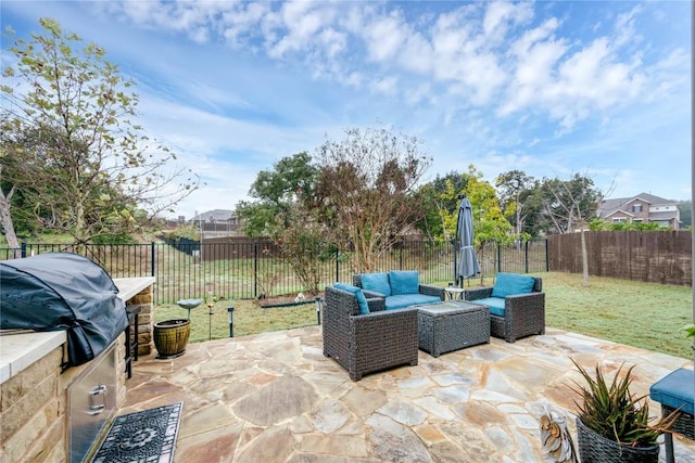 view of patio / terrace featuring outdoor lounge area and area for grilling