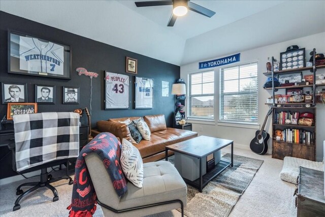 living room with carpet and ceiling fan