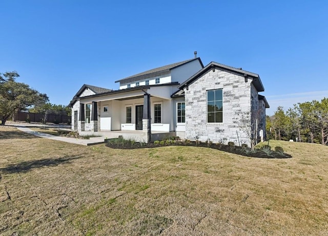 265 Gaucho Way, Dripping Springs, TX 78620 - view of front of property featuring stone siding and stucco siding