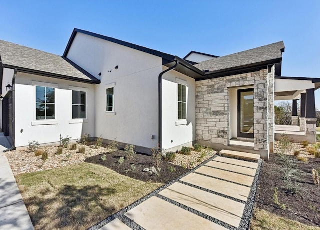 265 Gaucho Way, Dripping Springs, TX 78620 - view of front of house with stone siding and roof with shingles