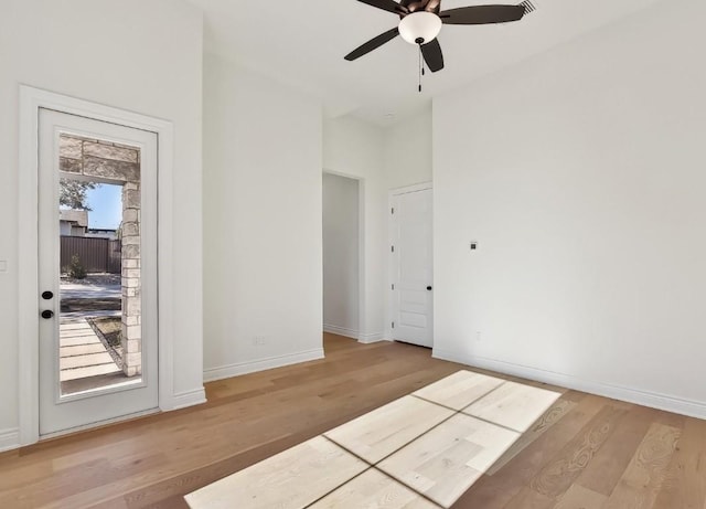 265 Gaucho Way, Dripping Springs, TX 78620 - unfurnished room featuring a ceiling fan, wood finished floors, and baseboards