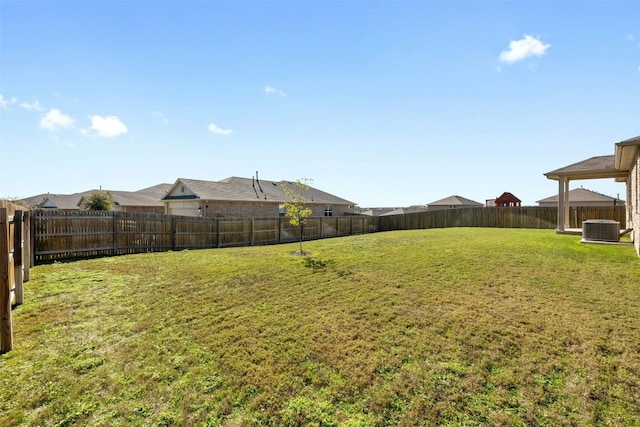 view of yard featuring central AC