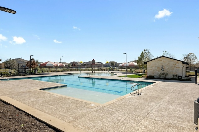 view of pool featuring a patio area