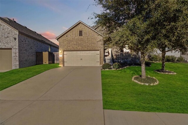 view of front of property with a yard