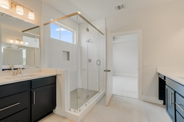 8504 Dongan Dr, Austin, TX 78744 - full bath with vanity, a stall shower, and tile patterned flooring