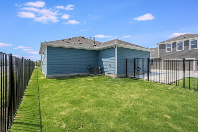8504 Dongan Dr, Austin, TX 78744 - rear view of property featuring cooling unit and a patio area
