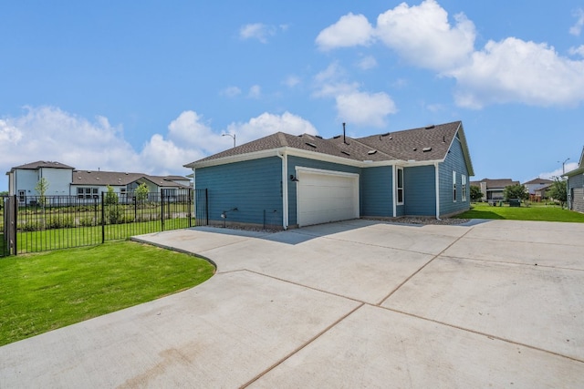 8504 Dongan Dr, Austin, TX 78744 - view of side of home featuring an attached garage, concrete driveway, a residential view, and a shingled roof