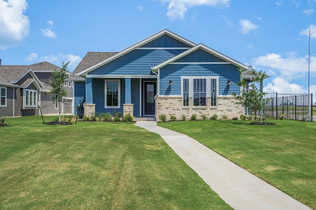8504 Dongan Dr, Austin, TX 78744 - craftsman inspired home with board and batten siding, brick siding, and a porch