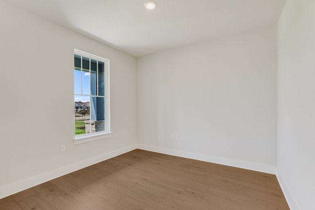 8504 Dongan Dr, Austin, TX 78744 - unfurnished room with wood finished floors and baseboards
