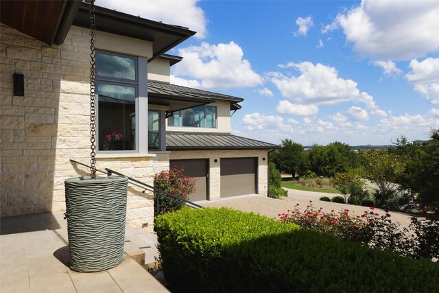 view of home's exterior with a garage