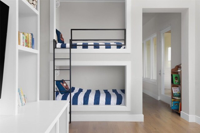 bedroom with light hardwood / wood-style floors