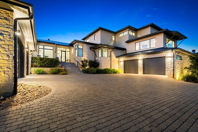 view of front of house with a garage