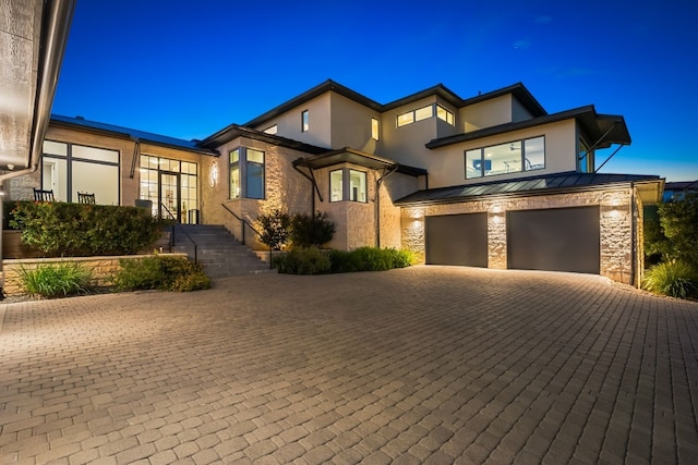 view of front of home featuring a garage