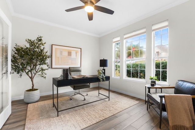 office space with ceiling fan, ornamental molding, and dark wood-type flooring