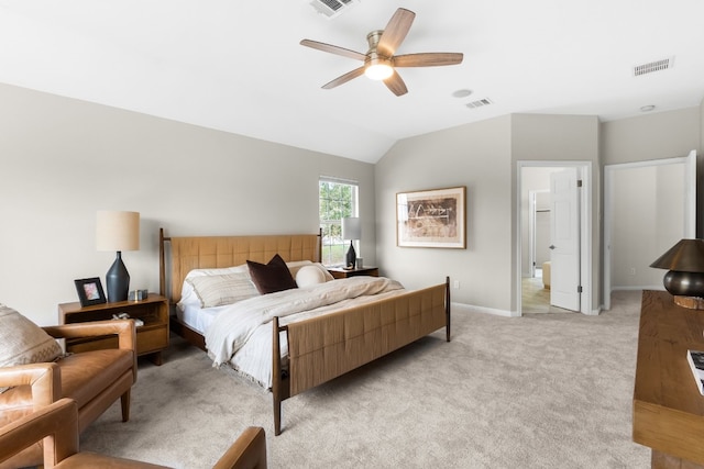 carpeted bedroom featuring connected bathroom, ceiling fan, and lofted ceiling