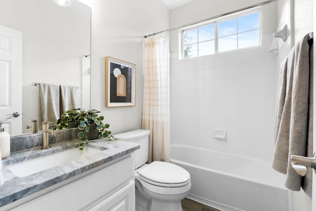 full bathroom featuring vanity, toilet, and shower / bathtub combination with curtain