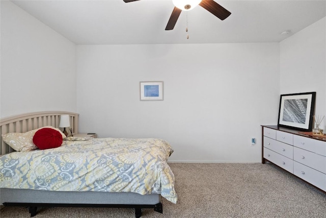 bedroom featuring ceiling fan and carpet floors
